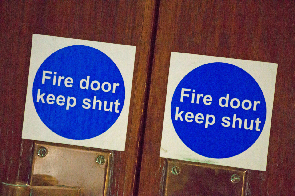 How to stop fire doors slamming